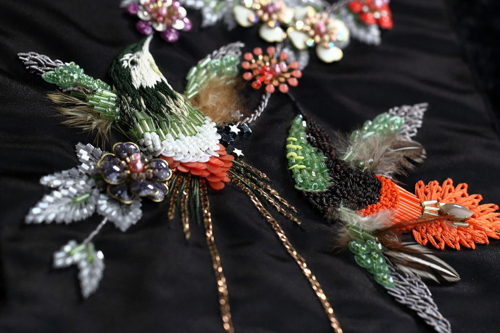 Hand Embroidered Bird & Florals with Raffia Embellishment on bird’s breast & body perfect for a sweater