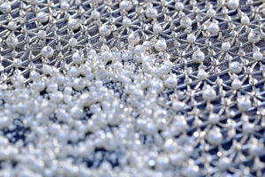 Hand embroidered customized bridal design with pearls, stones and beads.