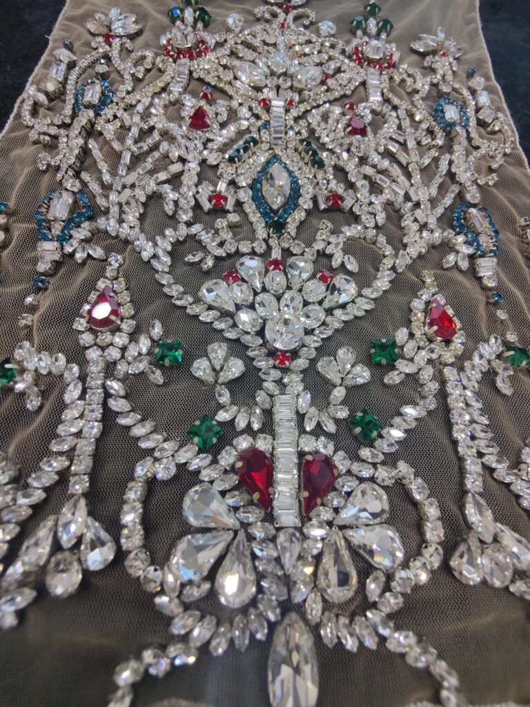 An elaborate and ornamental embroidery created by Ricamour Embroideries with Swarovski crystals. 