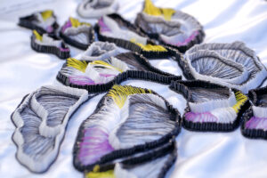 Couture design wade with hand embroidered bugles and silk threads